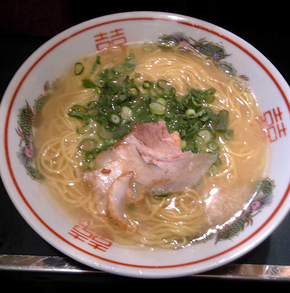A bowl of Hakata tonkotsu ramen with creamy white pork bone broth