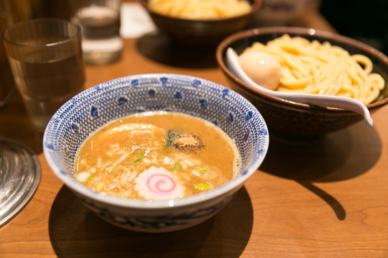 Tsukemen dipping noodles served separately from a bowl of concentrated broth